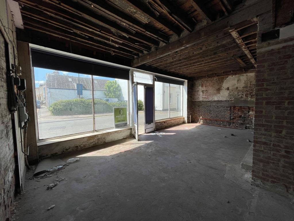 Lot: 65 - PLANNING FOR RESIDENTIAL CONVERSION IN DESIRABLE LOCATION - View onto high street from property